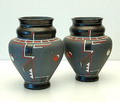 Two earthenware vases with koud-lak decoration ontwerp en uitvoering C.E.Antheunis 1910-1933 Gouda / the Netherlands Resp sizes 22 21,5 cm 