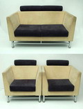  Twee fauteuils breed 80 cm en een tweezits-bank breed 136 cm Eastside bekleed met beige suede en losse donkerblauwe hoofdsteun en kussens powder-coated metaal met plastic voetjes ontwerp Ettore Sottsass 1983 uitvoering Knoll / Duitsland 1998 