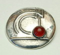Silver hammered brooch with cabuchon cut carneole design executed by Gebr.Reggers ca.1930 Amsterdam / the Netherlands 
