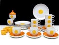  Porseleinen Studio-Linie ontbijtservies Plus met gele oranje accenten 8x ontbijtbord diam.20 cm 8x kop schotel melkkannetje suikerpot en 6x eierdop ontwerp Wolf Karnagle 1971 uitvoering Rosenthal / Duitsland 