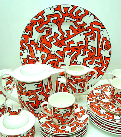 Breakfast table set 15-pcs incl serving plate Limited Edition with certificate 427/1000 in original box design Keith Haring 1991 executed by Villeroy Boch / Germany Plates 6x diam 22 cm Serving plate 1x diam 33 cm Cups saucers 6x diam saucer 14,8 cm Teapot with cover height 20,6 cm Sugar basin with cover height 10,6 cm Milkjug height 9 cm 
