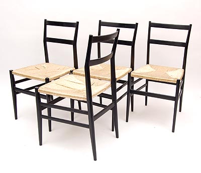 Side chairs 4x black lackered ashwood with woven India cane seat design Gio Ponti ca.1955 executed by Cassina / Italy 