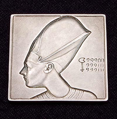 A rare silver medal “ Horemheb – Ichnaton ” design 1926 by Gerrit Rietveld 1888-1964 mint by the Stichtse Fabriek van Zilverwerken van Cornelis L.J Begeer Utrecht / the Netherlands as memorial-present for the open-air play “ Ichnaton ” during the Jubilee 1926 of the USC Utrechts Studenten Corps with the portret of Jonkheer Loudon in his role of Horemheb in the play Ichnaton written by Graadt van Roggen directed by Albert van Dalsum and for which Cris Agterberg produced the jewellery Provenance This medal has been offered in 1968 by C.Begeer to dhr Prof Dr Pieter Singelenberg 1918-2007 