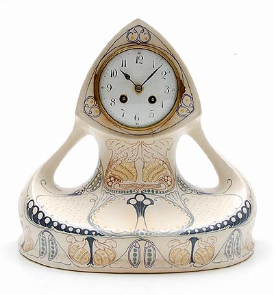 Earthenware mantle-clock white matt-glaze with polychrome linear decoration design Klaas Vet 1907-'10 executed by Arnhem Arnhemse Fayencefabriek the Netherlands 