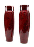 Twee hoge amphoravormige aardewerk vazen Distel model met decoratie van bloemen en vlinders decor beschildering Willem van Norden ca.1929 uitvoering Goedewaagen / Gouda Tekst herzien 