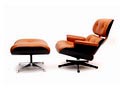  Eames Lounge Chair Model no.670 met Hocker Model no.671 zwart gelakt plywood met lederen kussens op gegoten aluminium frames ontwerp Charles Ray Eames 1956 uitvoering Herman Miller / USA 