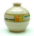 Earthenware Blokjes vase model no.7 with decoration in yellow blue orange green between orange layers on creme base painted by J.P.G.Belt executed by Potterie Kennemerland / Velsen the Netherlands 1929-'31 