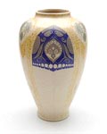 Earthenware vase with matt-glaze and stylized polychrome decoration of butterflies and peacocks design B Nienhuis ca.1903 executed by Plateelbakkerij de Distel Amsterdam / the Netherlands 