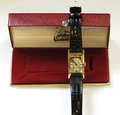 Art Deco horloge Omega Swiss made in orginele staat 18 kt geelgouden kast orginele doublé Omega gesp ca.1938 Kast met ingelegde emaille keilen wijzerplaat tu-tone 