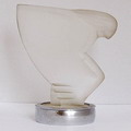 Autosymbool van gesatineerd persglas met org metalen bevestigingsring Engel ontwerp Lucienne Bloch Lit Wendingen 1930 pag.23 Autosymbolen 1930 Art Nouveau en Art Deco in Nederland Leidelmeijer-van der Cingel 1983 pag 109 afb 110 