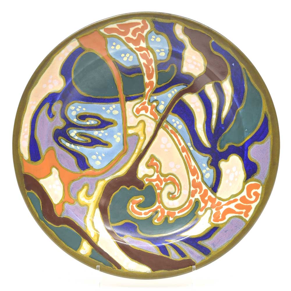 Earthenware wallplate with polychrome glazed decoration 